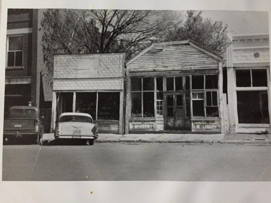 This is the storefront where Emanuel and his musical friends gathered every Saturday night for 27 years before moving to another building. Pictured is Emanuel Wood's 1956 International pick-up and Emanuel's brother McKinley Wood's 1957 Chevrolet.  Mack took the photo when he visited Emanuel in 1959